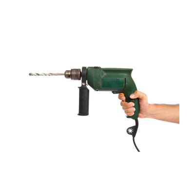 Boormachine hand met groene boormachine